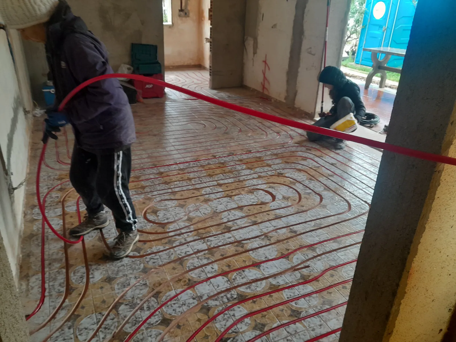 Team members working on milled channels on site